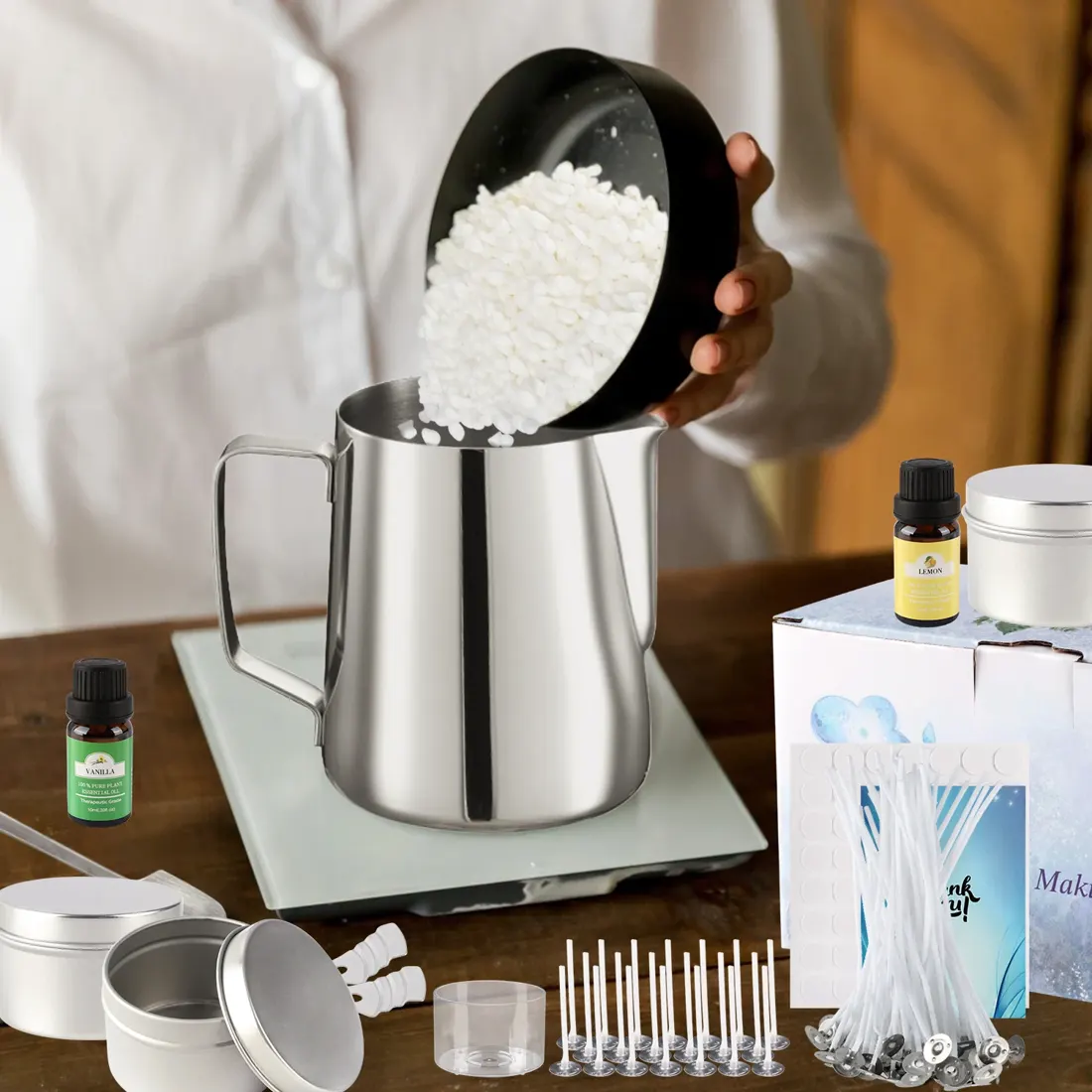 Soy wax flakes being poured into the melting pitcher